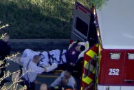 <p>A man who was placed in handcuffs by police is loaded into a paramedic vehicle after a shooting incident at Marjory Stoneman Douglas High School in Parkland, Florida, U.S. February 14, 2018 in a still image from video. (Photo: WSVN.com via Reuters) </p>