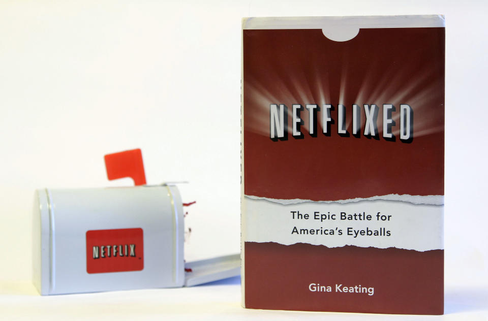 Gina Keating's book Netflixed: The Epic Battle for America's Eyeballs is photographed in San Francisco, Tuesday, Oct. 9, 2012. The book, set to go on sale Thursday, Oct. 11, 2012, tries to debunk a widely told tale about the company's origins and paints a polarizing portrait of its star CEO Reed Hastings. (AP Photo/Jeff Chiu)