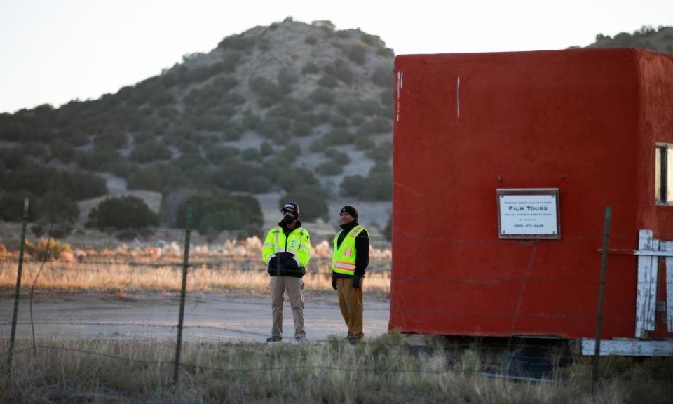 Security guards stand near the entrance to Bonanza Creek Ranch where Hollywood actor Alec Baldwin fatally shot a cinematographer and wounded a director