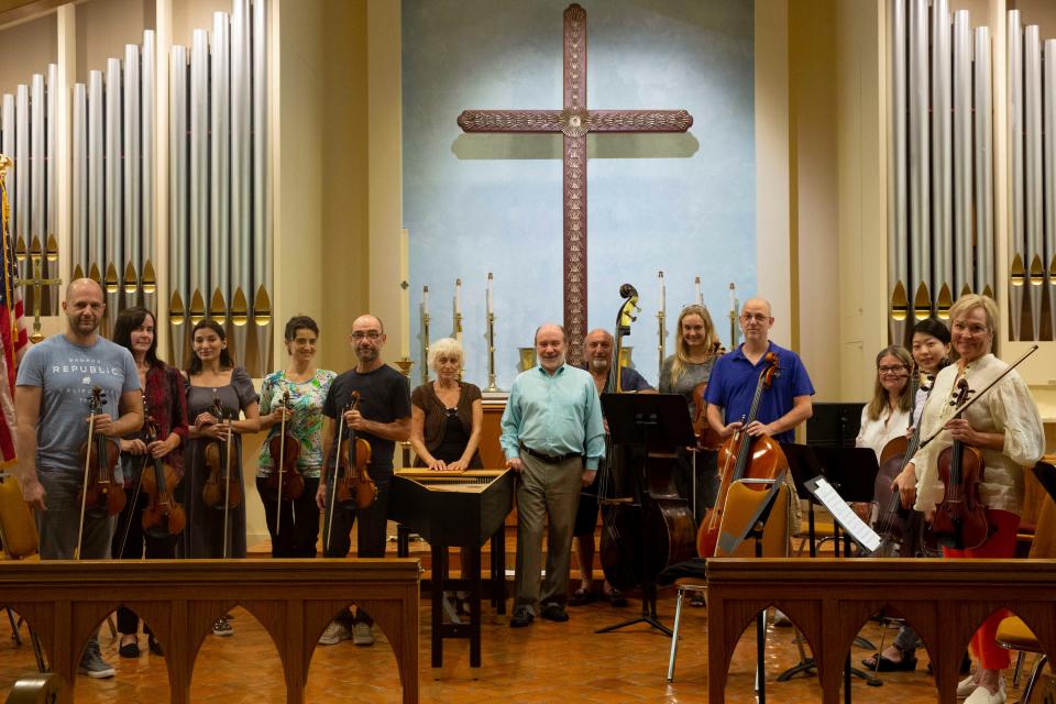 The Camerata of Naples and Alex Goldstein, center, rehearse, Monday, May 2, 2022, at St. John’s Episcopal Church in Naples, Fla.Alex Goldstein, who is known around the skating world as a terrific programmer for ice dance and pairs music – his skaters have won handfuls of Olympic medals – has composed a set of seven variations on a theme by Albinoni. Its U.S. premiere is Sunday with the Camerata of Naples.