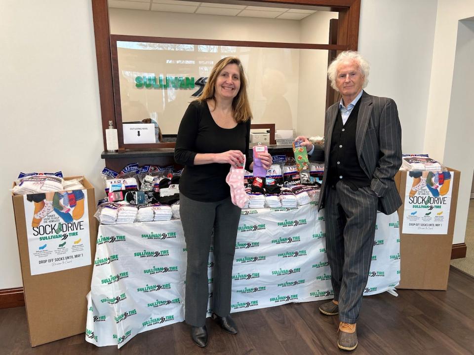 From now until May 1, Sullivan Tire is holding a Sock Drive to help those experiencing homelessness remain warm and healthy. Pictured left to right are Laurie Fadden from their Human Resources Department and Vice President of Marketing, Paul Sullivan.
