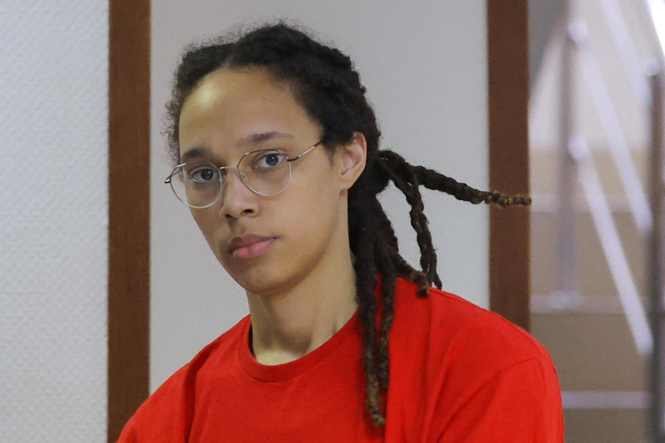 U.S. basketball player Brittney Griner is escorted before a court hearing in Khimki, outside Moscow, Russia, July 7, 2022. / Credit: EVGENIA NOVOZHENINA / REUTERS