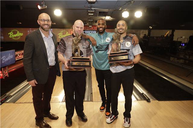 Mookie Betts, right, and partner Tommy Jones hold their trophies after winning Chris Paul's celebrity bowling event in 2019. (Courtesy of PBA) 