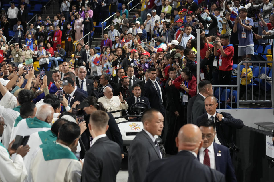 Pope Francis arrives to preside over a mass at the Steppe Arena in the Mongolian capital Ulaanbaatar, Sunday, Sept. 3, 2023. Francis is in Mongolia to minister to one of the world's smallest and newest Catholic communities. Neighboring China's crackdown on religious minorities has been a constant backdrop to the trip, even as the Vatican hopes to focus attention instead on Mongolia and its 1,450 Catholics. (AP Photo/Andrew Medichini)