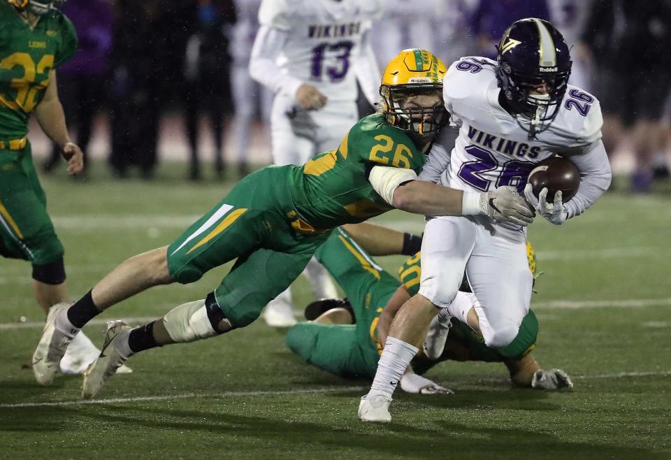 North Kitsap and Lynden played in a rain-soaked semifinal in 2021. The Lions prevailed 15-10 with a touchdown in the final minute of the game.