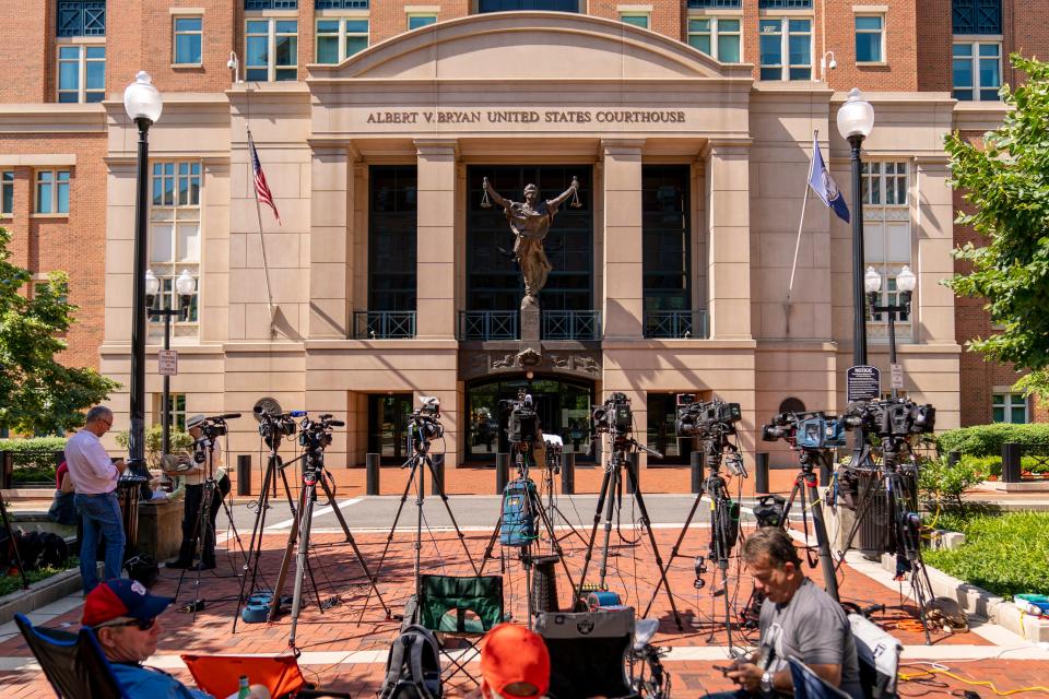Cameras are set up outside the U.S. District Courthouse before the sentencing of El Shafee Elsheikh in Alexandria, Va., Friday, Aug. 19, 2022. Elsheikh was convicted on April 14, 2022 of kidnapping and murdering freelance journalist James Foley as well as participating in the detention and murders of Steven Sotloff, Kayla Mueller and Peter Kassig, all in 2014. (AP Photo/Andrew Harnik)