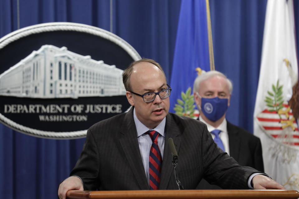 Acting Assistant U.S. Attorney General Jeffrey Clark speaks as he stands next to Deputy Attorney General Jeffrey A. Rosen during a news conference at the Justice Department in Washington, October 21, 2020.  / Credit: Yuri Gripas / AP