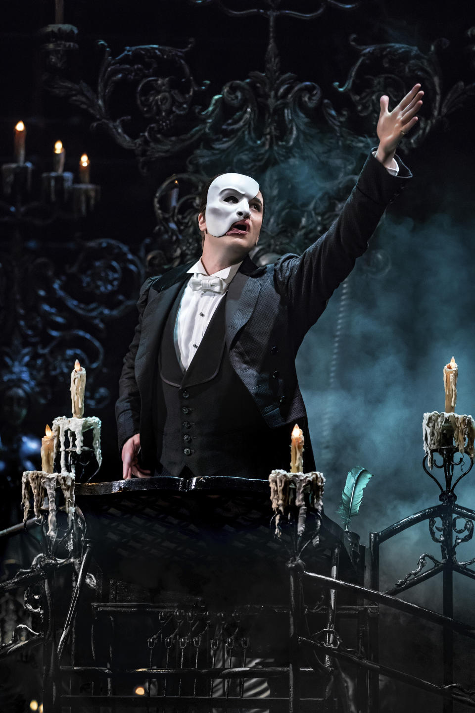 This image released by The Publicity Office shows Ben Crawford during a performance of "The Phantom of the Opera," in New York. (Matthew Murphy/The Publicity Office via AP)