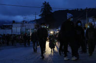 Protesters gather to block the Inter American Highway in Totonicapan, Guatemala, after Indigenous leaders here called for a nationwide strike to pressure Guatemalan President Alejandro Giammattei to resign, early Thursday, July 29, 2021. The protest comes in response to the firing of Special Prosecutor Against Impunity Juan Francisco Sandoval by Attorney General Consuelo Porras. (AP Photo/Moises Castillo)