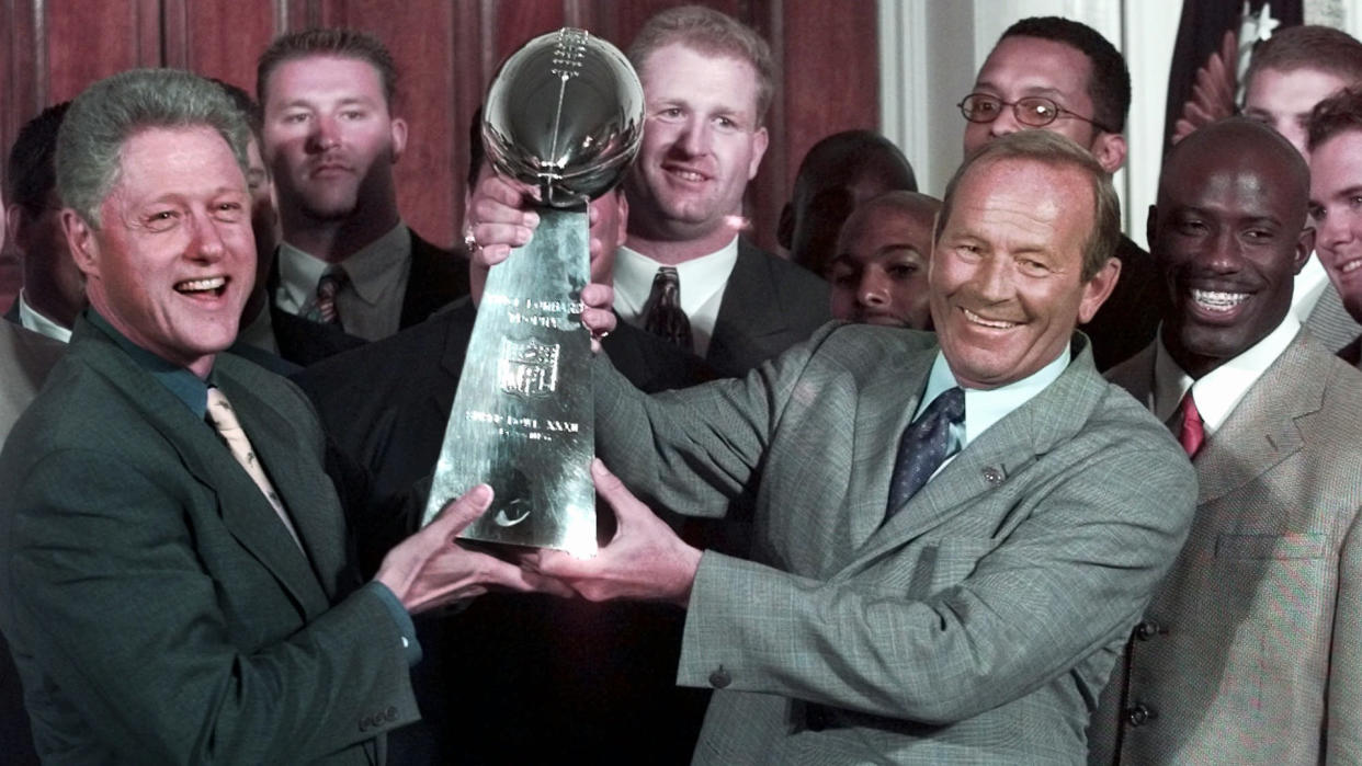 Mandatory Credit: Photo by Greg Gibson/AP/Shutterstock (5998757a)CLINTON DAVIS BOWLEN President Clinton, left, and Denver Broncos owner Pat Bowlen hold the Vince Lombardi Trophy during a ceremony at the White House where the president honored the Super Bowl XXXII champions.