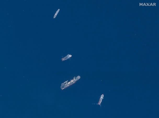 PHOTO: The Atalante, Horizon Arctic, Deep Envergy and Skandi Vinland ships search for the missing submersible in the Atlantic Ocean on June 22, 2023. (Satellite image ©2023 Maxar Technologies)