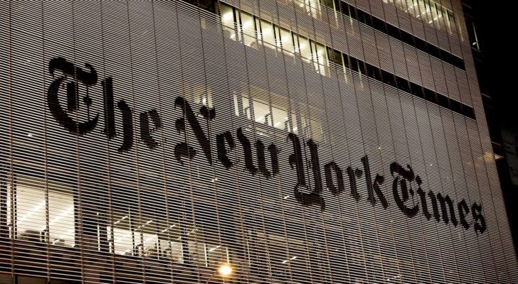 The headquarters of the New York Times (NYT) at night.