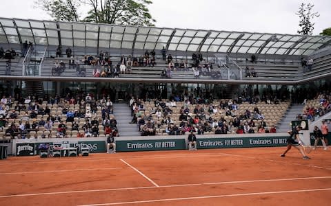  Britain's Johanna Konta plays a backhand return to Czech Republic's Marketa Vondrousova during their women's singles semi-final match on day 13 of The Roland Garros 2019 French Open tennis tournament in Paris on June 7, 2019 - Credit: AFP