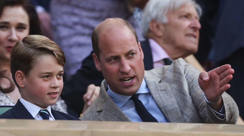 ADRIAN DENNIS/AFP via Getty Prince George and Prince William attend Wimbledon on July 10, 2022