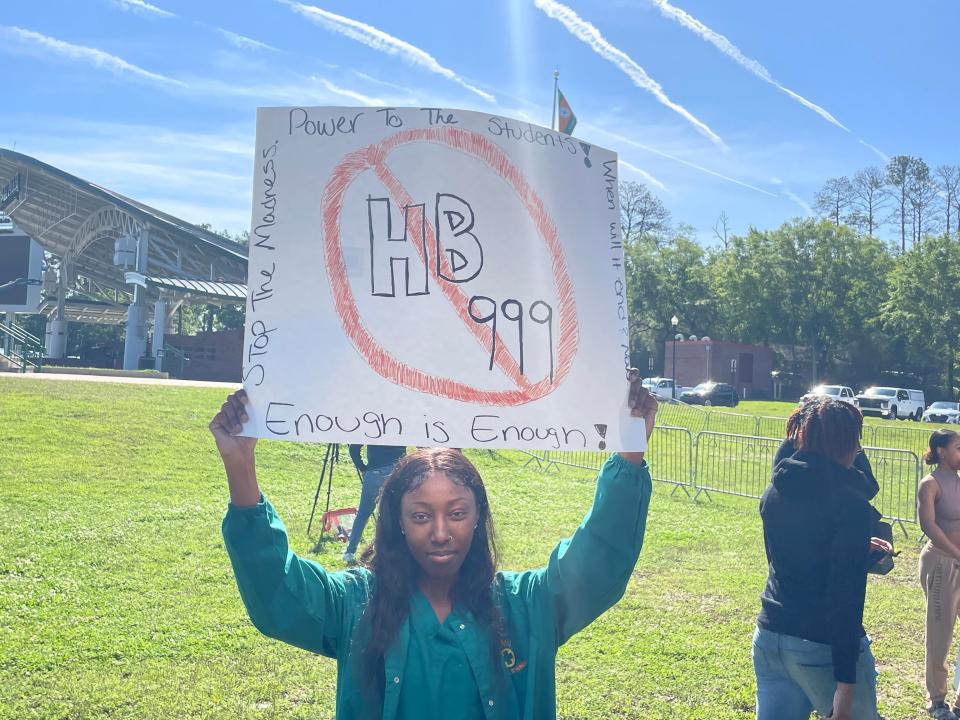 FAMU student Stormy Smith protests to fight against HB999 outside of a Florida Board of Governors meeting on campus Wednesday, March 29, 2023.