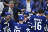 Toronto Maple Leafs head coach Sheldon Keefe, top left, calls a timeout while playing against the Tampa Bay Lightning during the third period of Game 7 in an NHL hockey first-round playoff series in Toronto, Saturday, May 14, 2022. (Nathan Denette/The Canadian Press via AP)