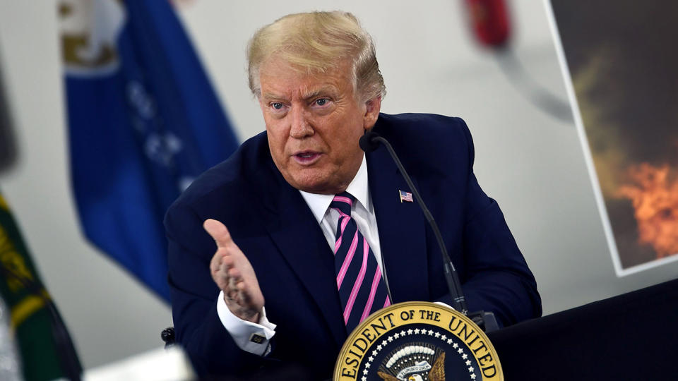 President Trump speaks during a briefing on wildfires with local and federal fire and emergency officials in McClellan Park, California on September 14, 2020. (Photo by BRENDAN SMIALOWSKI/AFP via Getty Images)