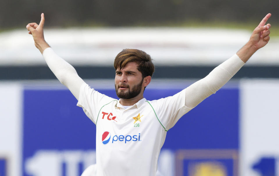 Pakistan's Shaheen Shah Afridi celebrates the wicket of Sri lanka's Dimuth Karunarathne during the first day of the first test cricket match between Sri Lanka and Pakistan in Galle, Sri Lanka, Saturday, July 16, 2022. (AP Photo)