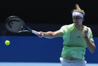 Germany's Alexander Zverev plays a forehand return during a practice session ahead of the Australian Open tennis championships at Melbourne Park, Melbourne, Australia, Friday, Jan. 12, 2024. (AP Photo/Andy Wong)