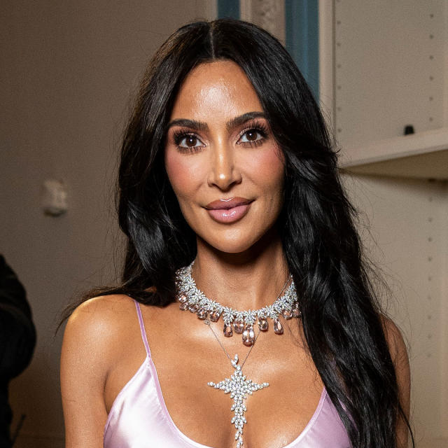 Kim Kardashian showcases her tiny waist in vintage Chanel pink and