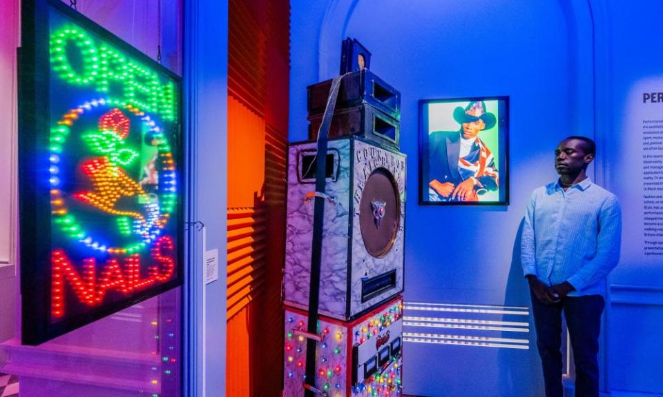 Sound system and neon sign at The Missing Thread exhibition at Somerset House, London. 