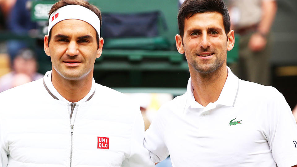 Roger Federer and Novak Djokovic, pictured here before the final at Wimbledon in 2019.