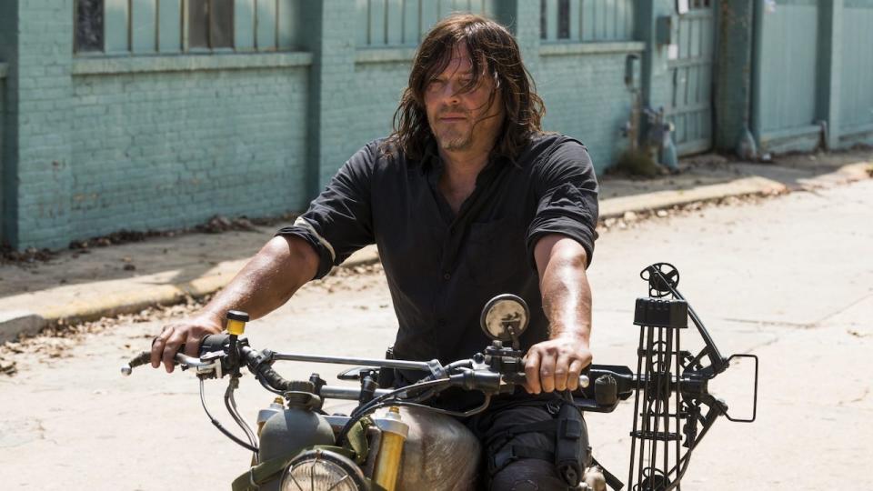 Norman Reedus riding motorcycle in The Walking Dead