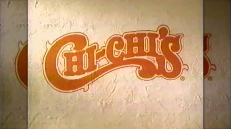 Chi-Chi's logo on stucco wall