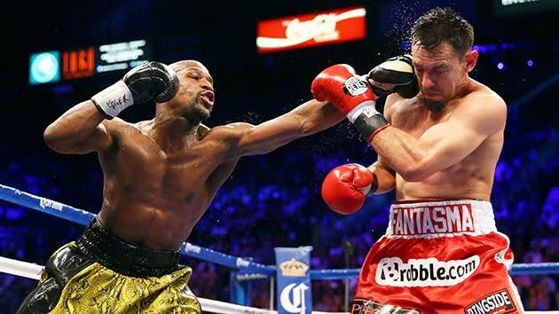 Guerrero is punched by Mayweather. Pic: Getty