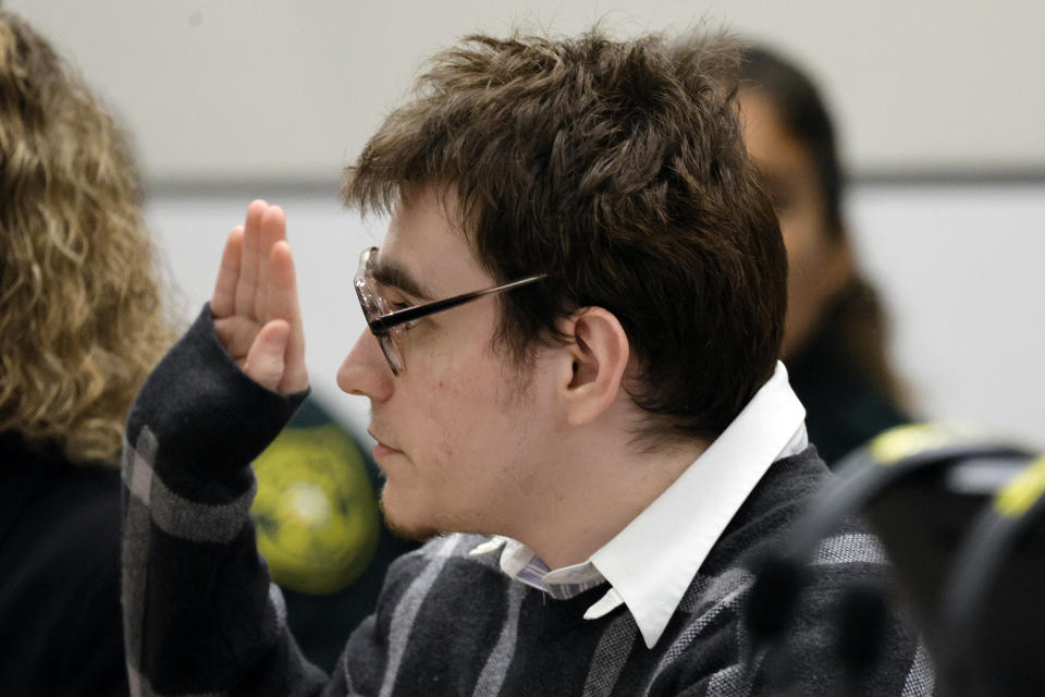 Marjory Stoneman Douglas High School shooter Nikolas Cruz is sworn in during the penalty phase of Cruz's trial at the Broward County Courthouse in Fort Lauderdale on Wednesday, Sept. 14, 2022. His defense team announced their intention to rest their case. Cruz previously plead guilty to all 17 counts of premeditated murder and 17 counts of attempted murder in the 2018 shootings. (Amy Beth Bennett/South Florida Sun Sentinel via AP, Pool)