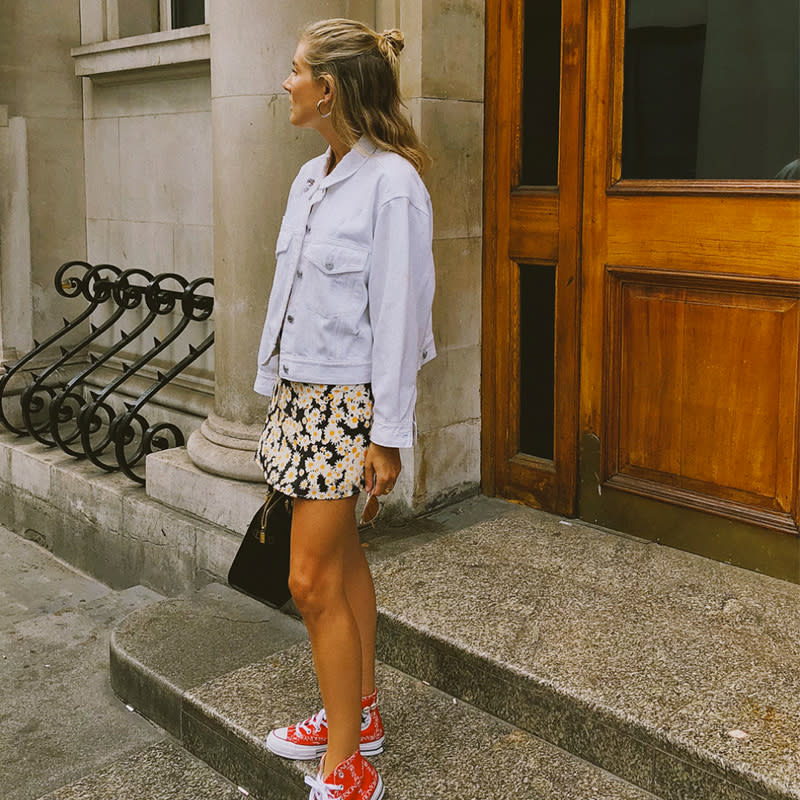 <p><span>Add some color to a floral-print dress and white jean jacket with a pair of tomato-red sneakers.</span></p> <h4>@lucywilliams02</h4>