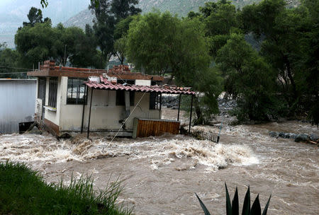 View of a flooded home after the Rimac river overflowed near the Central Highway in Huarochiri, Lima, Peru, March 23, 2017. REUTERS/Guadalupe Pardo