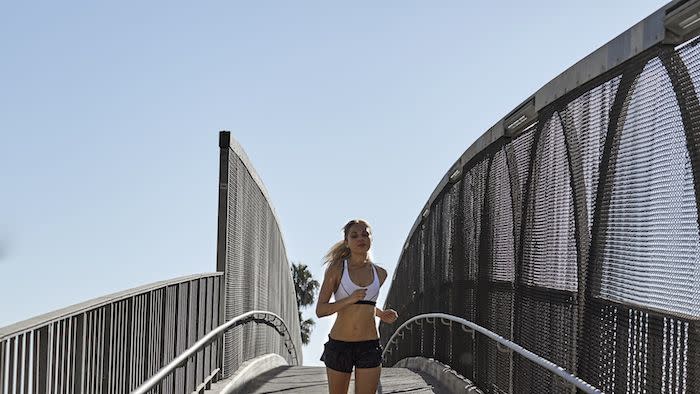 woman-jogging-over-bridge.jpg