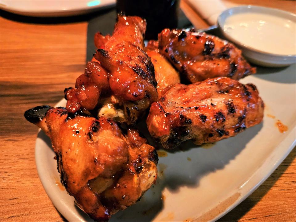 The honey ginger grilled chicken wings at Molly's Pub in downtown Sarasota photographed July 22, 2023.