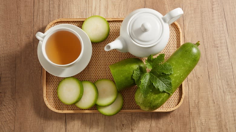 sliced winter melon and tea