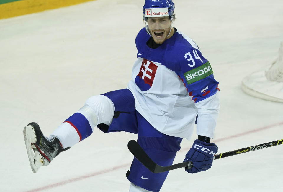 Peter Cehlarik of Slovakia celebrates scoring a goal during the Ice Hockey World Championship group A match between the Denmark and Slovakia at the Olympic Sports Center in Riga, Latvia, Saturday, May 29, 2021. (AP Photo/Oksana Dzadan)