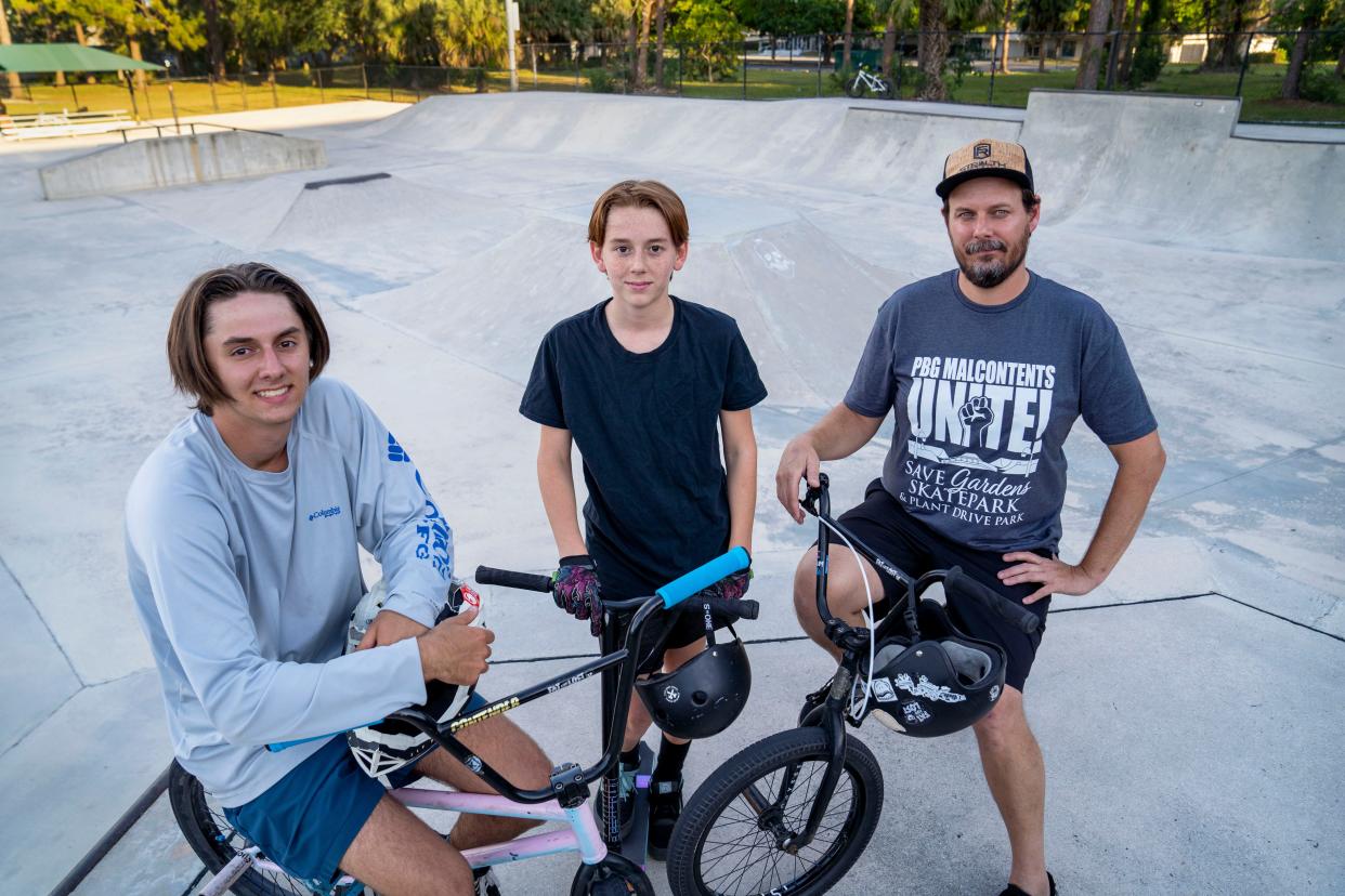 Adam Cranmer with his sons Ethan, left, and Lukas, center, at the skate park in Plant Drive Park on April 17, 2024 in Palm Beach Gardens. Adam started a social media campaign and "petition" drive to save the park.