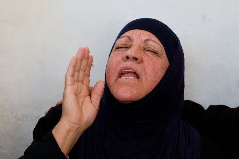 Mother of a Palestinian man killed by Israeli forces reacts, near Ramallah in the Israeli-occupied West Bank