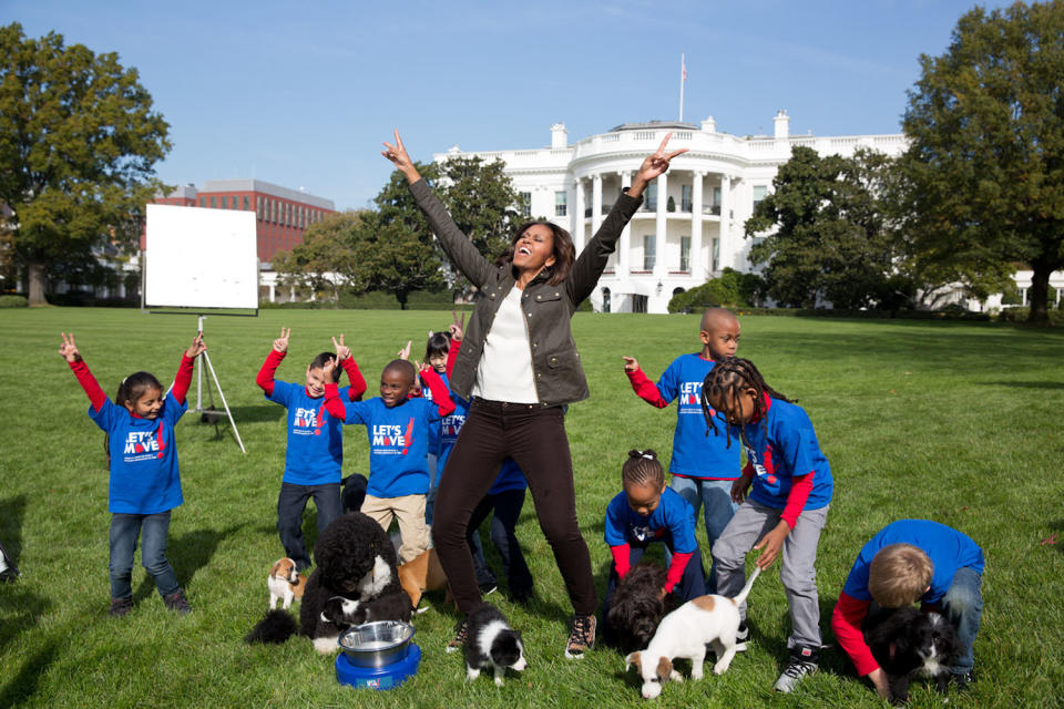 Oct. 28, 2013 'Amanda Lucidon made this photograph of the First Lady as she participated in a filming for the Animal Planet Puppy Bowl on the South Lawn of the White House.' (Official White House Photo by Amanda Lucidon) This official White House photograph is being made available only for publication by news organizations and/or for personal use printing by the subject(s) of the photograph. The photograph may not be manipulated in any way and may not be used in commercial or political materials, advertisements, emails, products, promotions that in any way suggests approval or endorsement of the President, the First Family, or the White House. (Photo by Amanda Lucidon/The White House/Corbis via Getty Images)