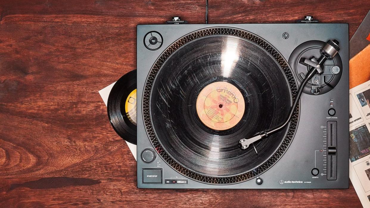 a silver and black record player