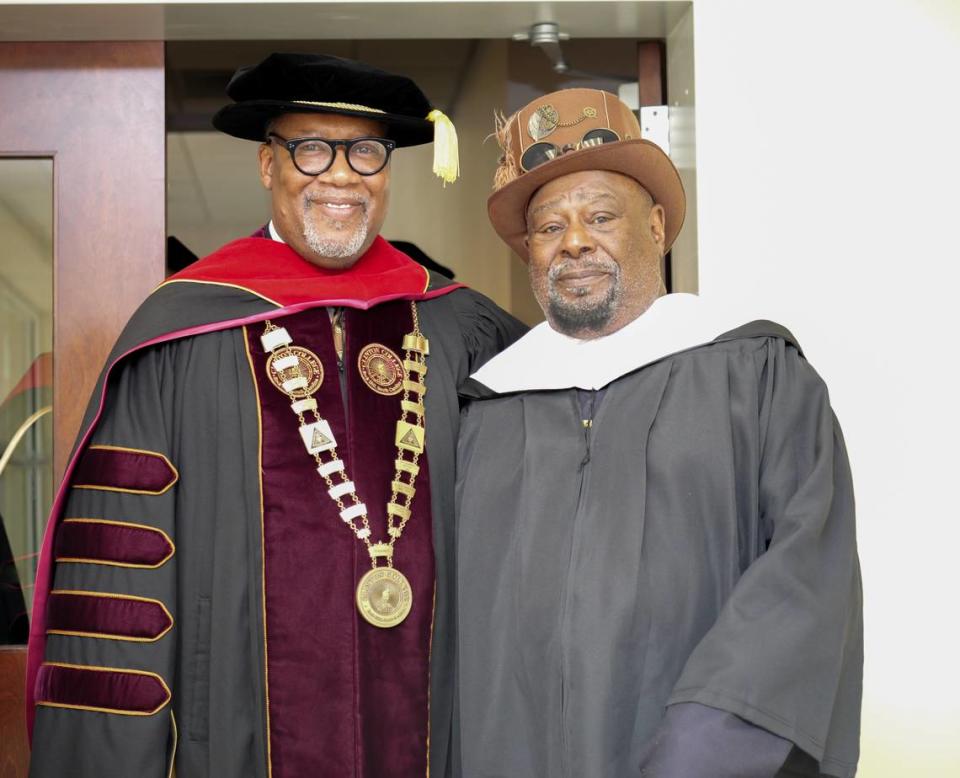 Clinton College president Lester McCorn with funk music legend George Clinton, who received an honorary degree from the Rock Hill school on Friday.