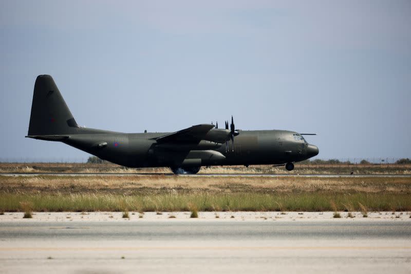 British nationals evacuated from Sudan arrive at the Larnaca International Airport, in Larnaca