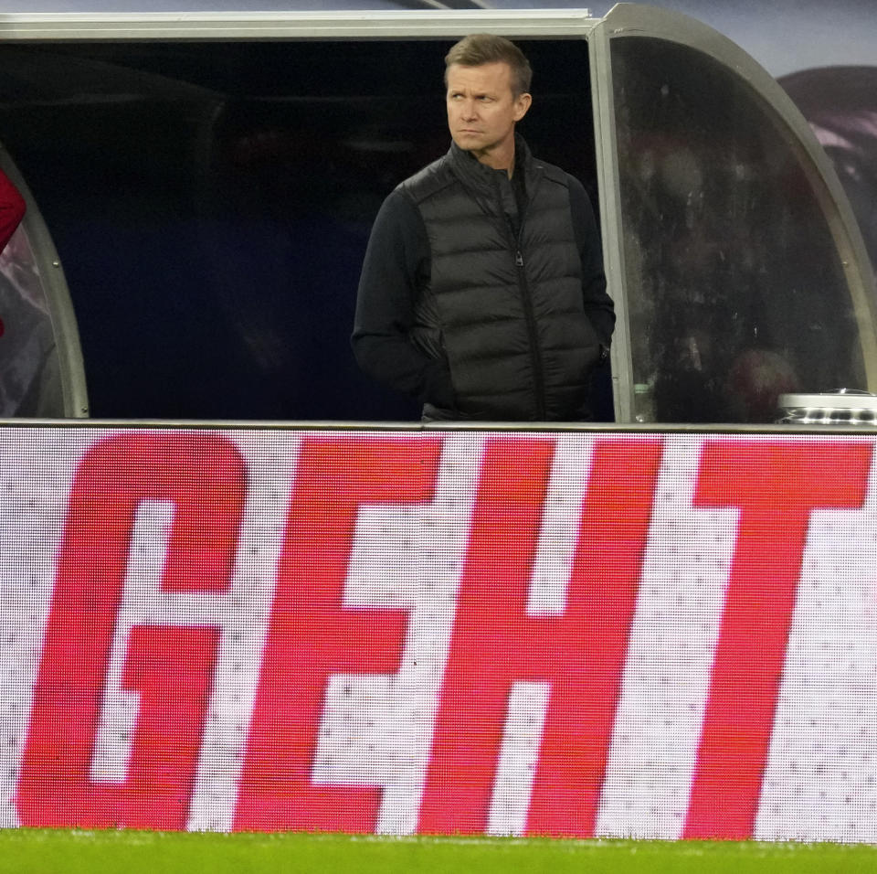 FILE - Leipzig's head coach Jesse Marsch during the German Bundesliga soccer match between RB Leipzig and Borussia Dortmund in Leipzig, Germany, on Nov. 6, 2021. Word reads: 'leaves'. American Jesse Marsch is no longer coach of Bundesliga team Leipzig. The club said Sunday that the two had “mutually agreed to end the cooperation. That is the result of an in-depth analysis and intensive discussions” after Friday’s 2-1 loss at Union Berlin. (AP Photo/Michael Sohn, file)