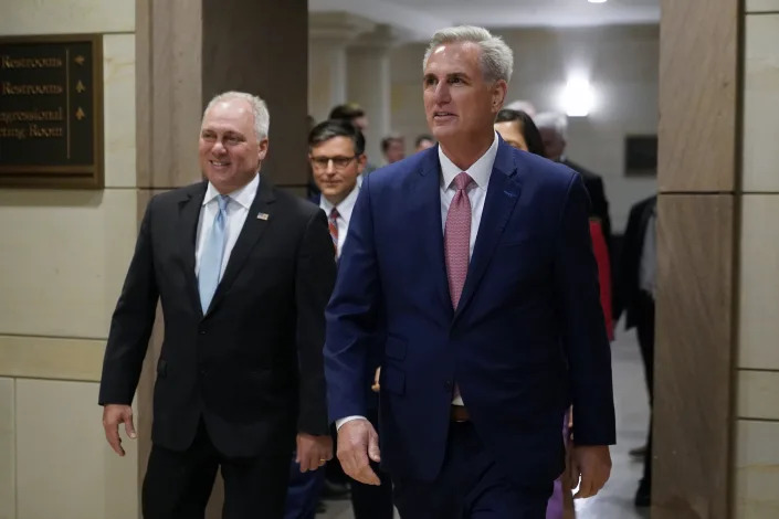 FILE - House Minority Leader Kevin McCarthy of Calif., right, and House Minority Whip Steve Scalise, R-La., arrive to speak with members of the press after a House Republican leadership meeting, Nov. 15, 2022, on Capitol Hill in Washington. McCarthy won the House Speaker nomination from his colleagues, while Scalise was voted majority leader. Even with their threadbare House majority, Republicans doubled down this week on using their new power to investigate the Biden administration and in particular the president’s son. (AP Photo/Patrick Semansky)