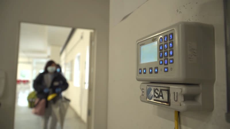 Workers are seen entering the ISA factory in Bastia Umbra