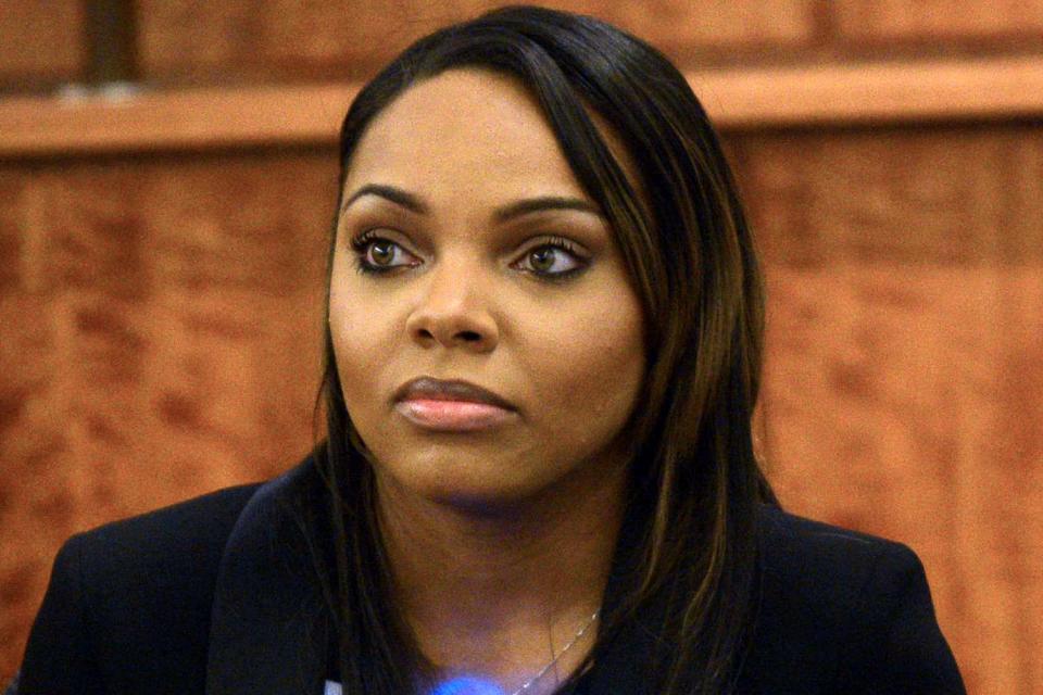 <p>Ted Fitzgerald/MediaNews Group/Boston Herald via Getty</p> Shayanna Jenkins during Aaron Hernandez