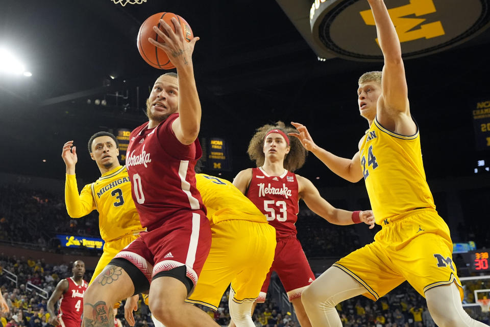 Nebraska guard C.J. Wilcher (0) reaches for the rebound during the first half of an NCAA college basketball game against Michigan, Sunday, March 10, 2024, in Ann Arbor, Mich. (AP Photo/Carlos Osorio)