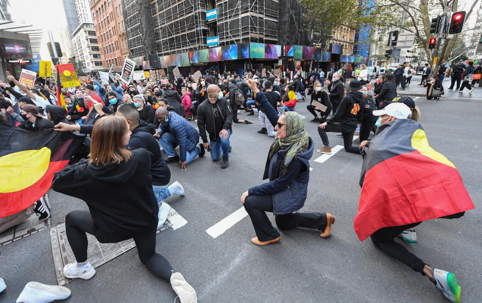 SYDNEY, AUSTRALIA - JUNE 06: Thousands of protestors marching in solidarity with "Black Lives Matter" down Castlereagh Street in the CBD on June 06, 2020 in Sydney, Australia. The event was organised to rally against aboriginal deaths in custody in Australia as well as in solidarity with protests across the United States following the killing of an unarmed black man George Floyd at the hands of a police officer in Minneapolis, Minnesota. (Photo by James D. Morgan/Getty Images)