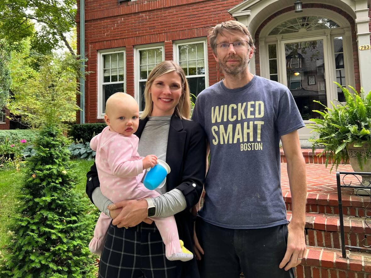 Lauren Schmidlin and her family outside of their Windsor home. The wait time for their family doctor has turned from days to months as they care for their children, one who is currently ill. (Josiah Sinanan / CBC News - image credit)