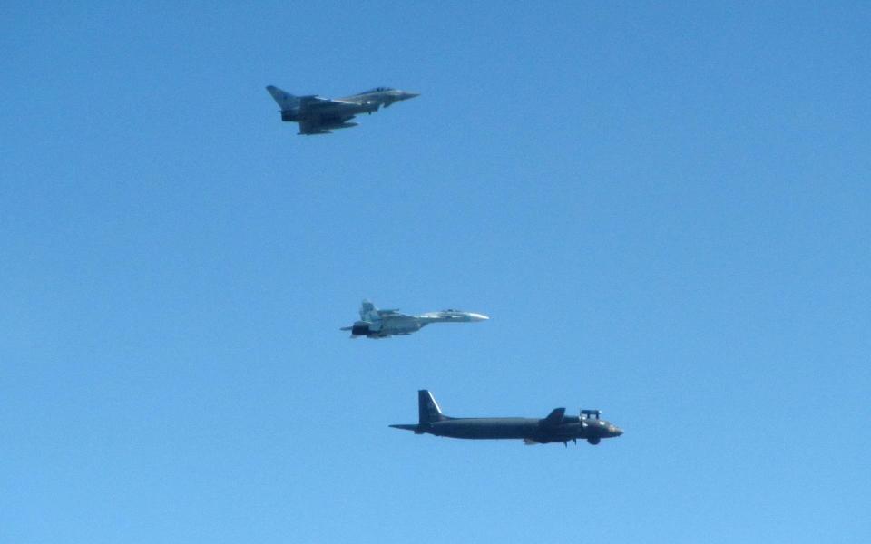 RAF Typhoon intercepting at Russian IL-38 ‘MAY’ Maritime Patrol Aircraft and one of the SU-27 Flanker Bs. - RAF